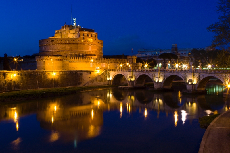 Castel Sant'Angelo_Rome_Italy.jpg - The Mausoleum of Hadrian, usually known as the Castel Sant'Angelo, is a towering cylindrical building in Rome, initially commissioned by the Roman Emperor Hadrian as a mausoleum for himself and his family. The building was later used as a fortress and castle, and is now a museum.